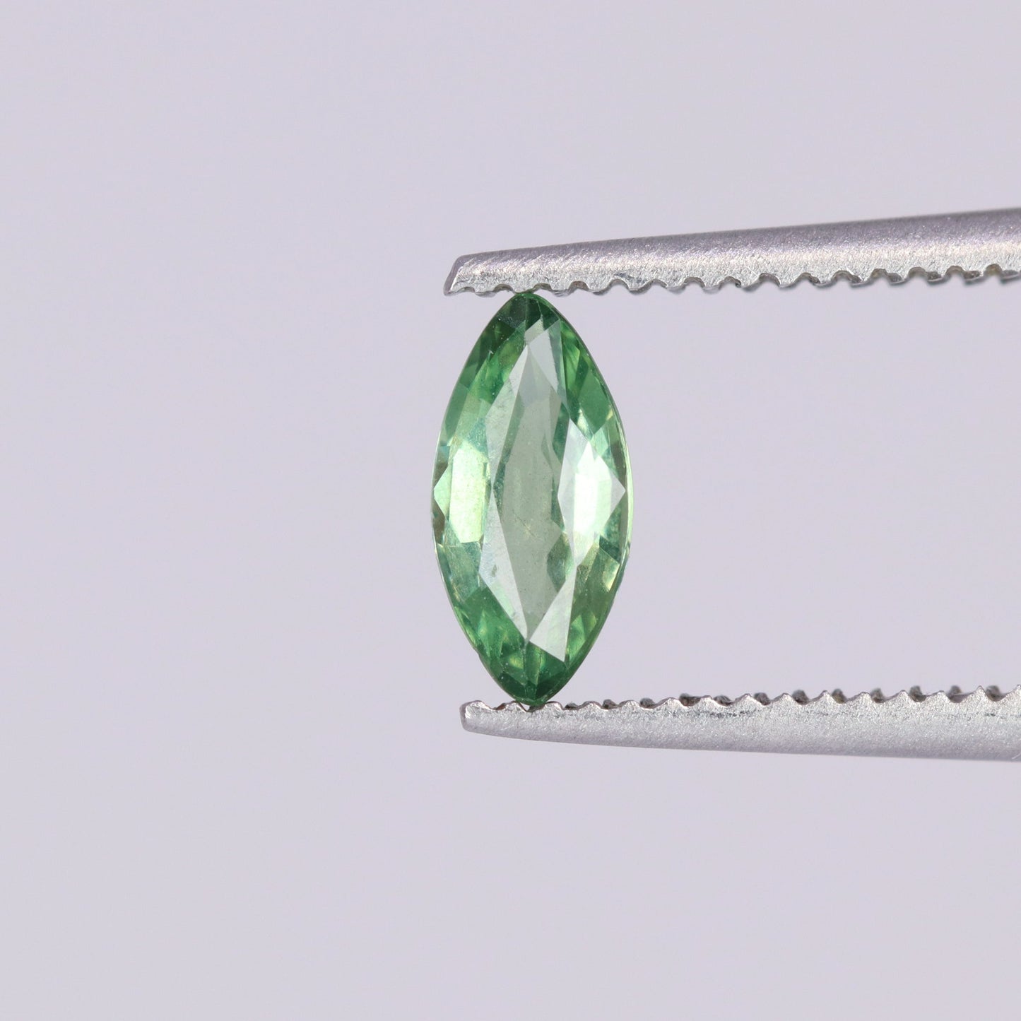 Green marquise cut loose sapphire for custom and bespoke engagement rings