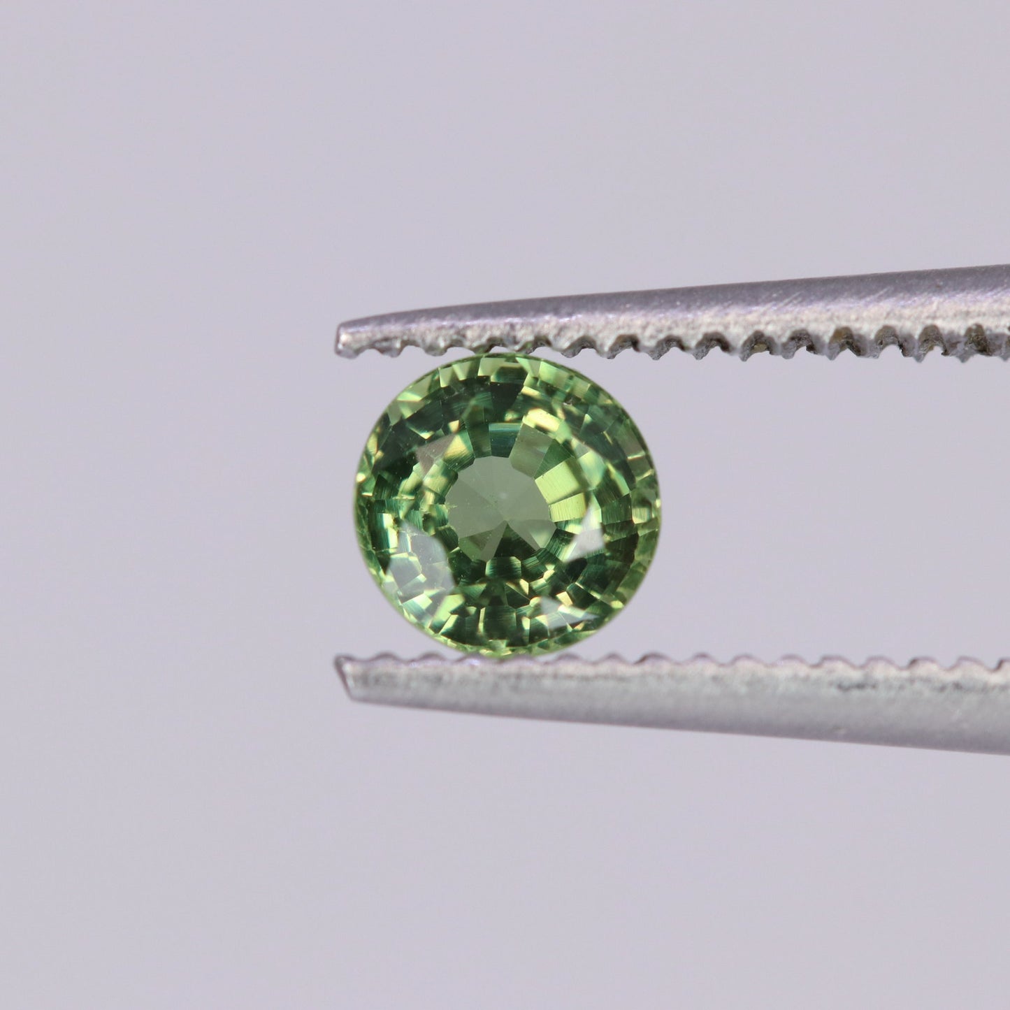 Round cut green sapphire for engagement rings