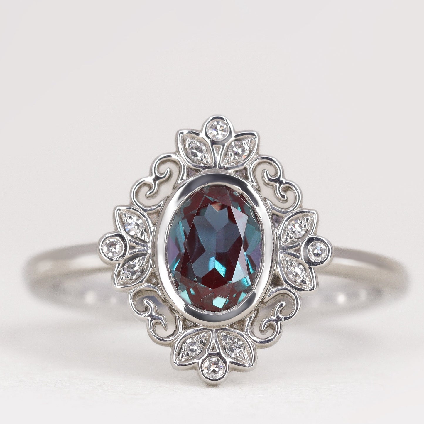 Art Deco oval cut alexandrite platinum engagement ring