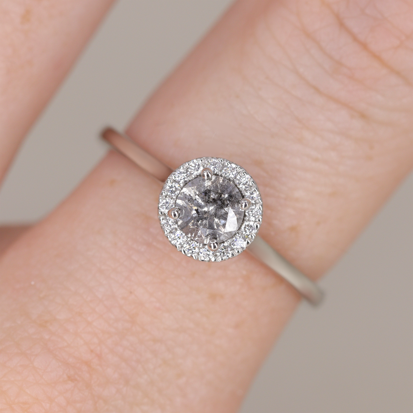 Salt and pepper diamond white diamond halo engagement ring in platinum