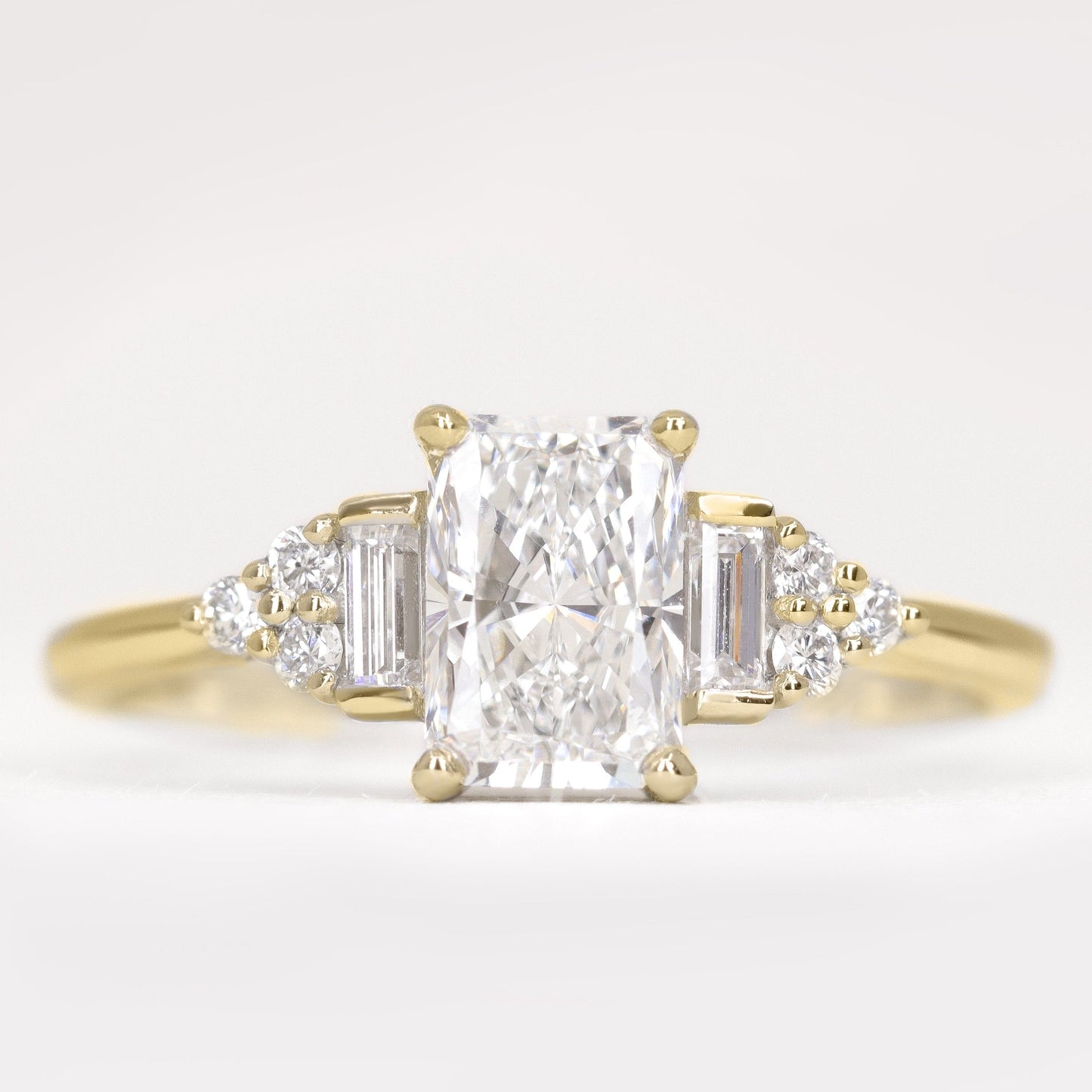 Art deco inspired radiant cut white diamond engagement ring