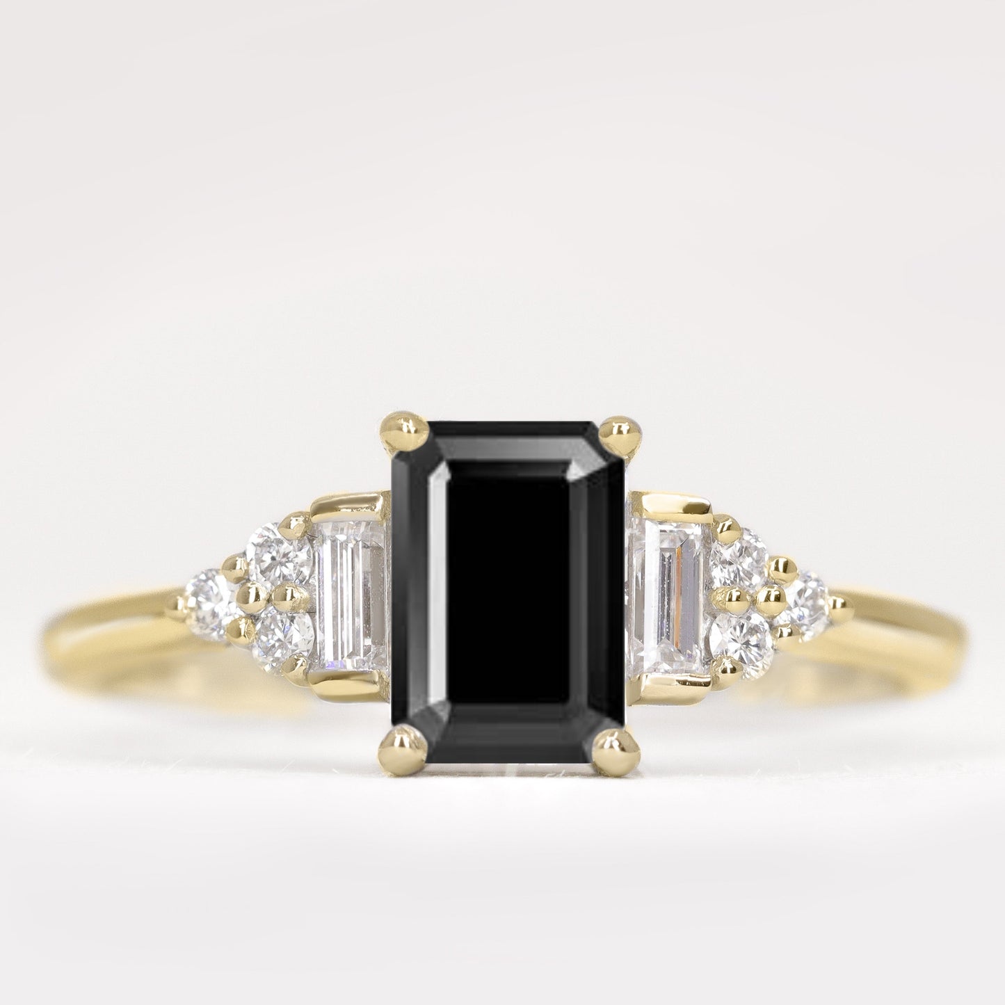Art deco emerald cut black diamond engagement ring with white diamond side stones