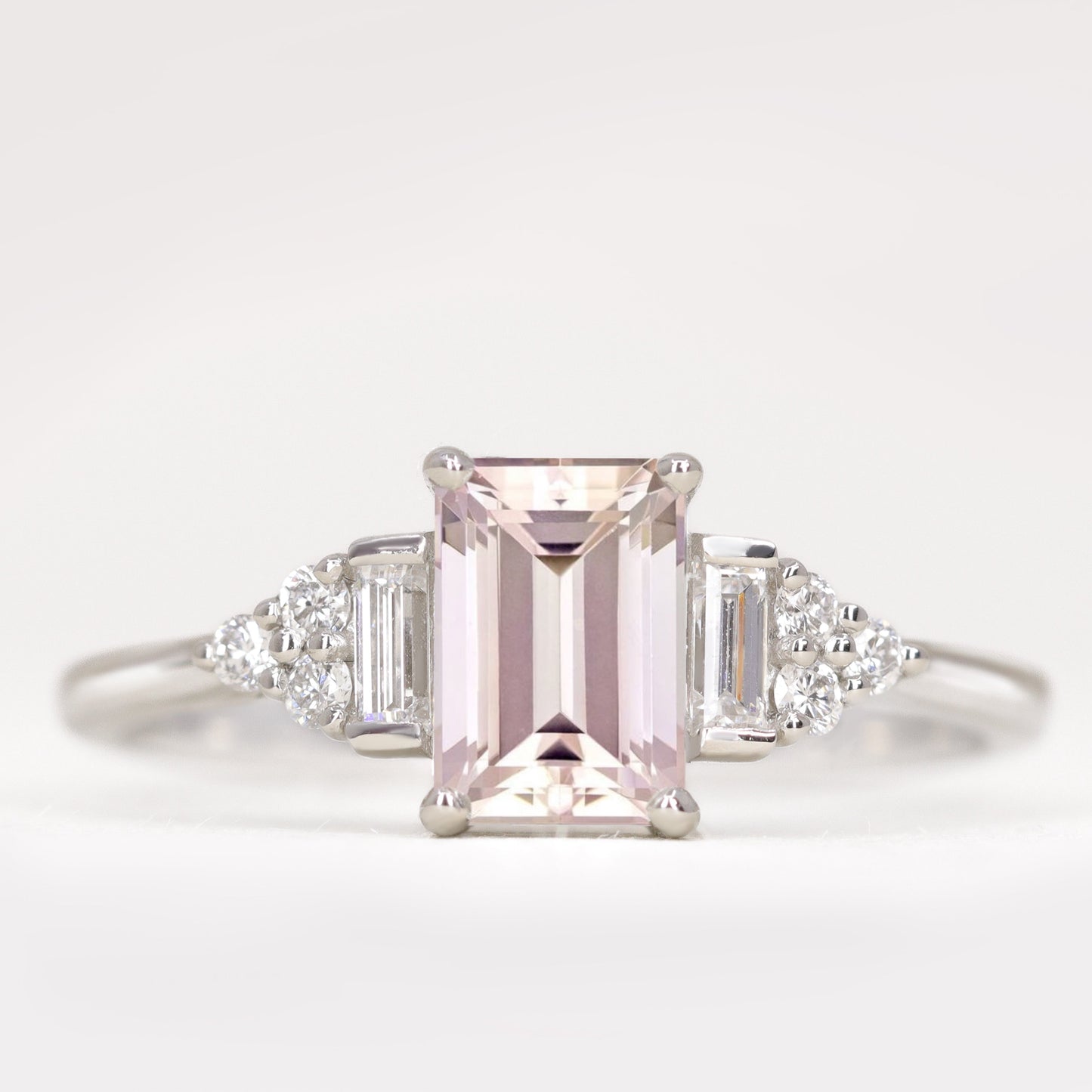 Art deco inspired emerald cut morganite and white diamond engagement ring
