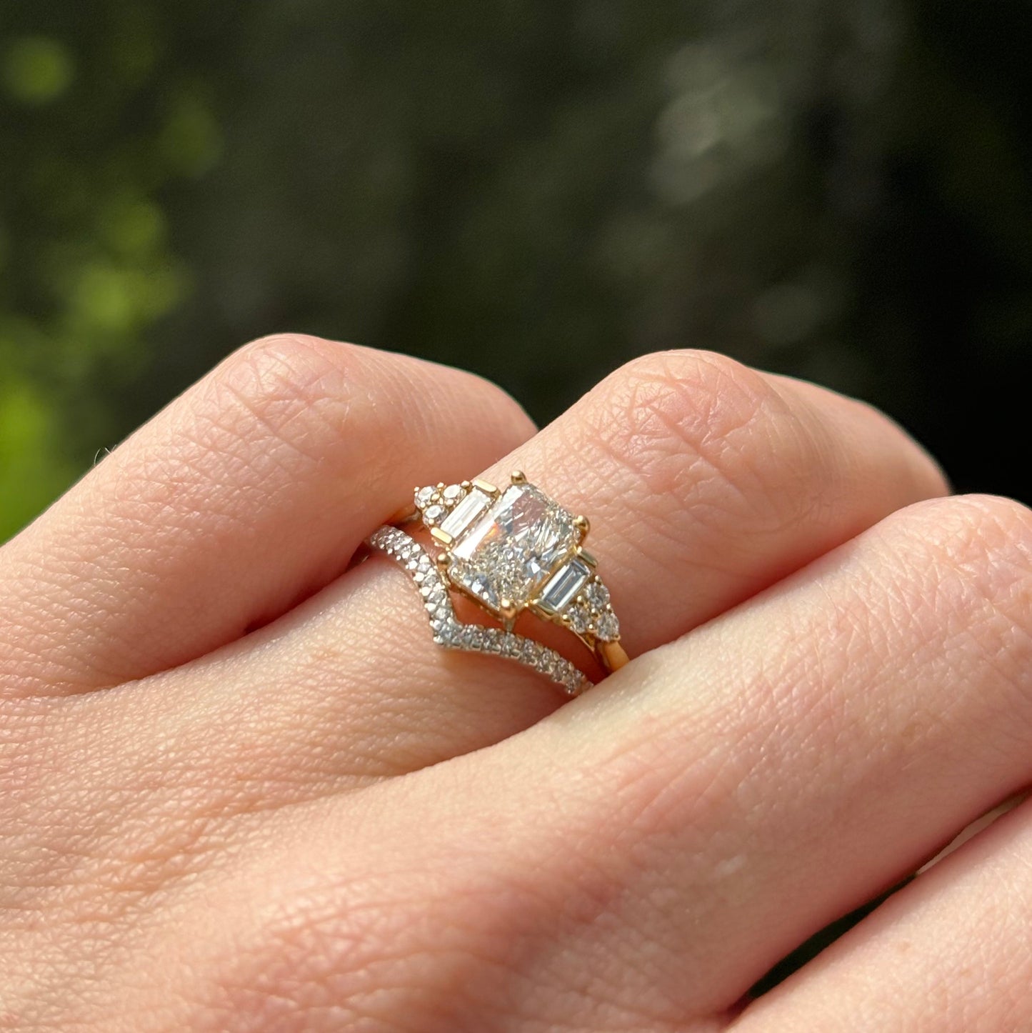 Art deco inspired radiant cut white diamond engagement ring