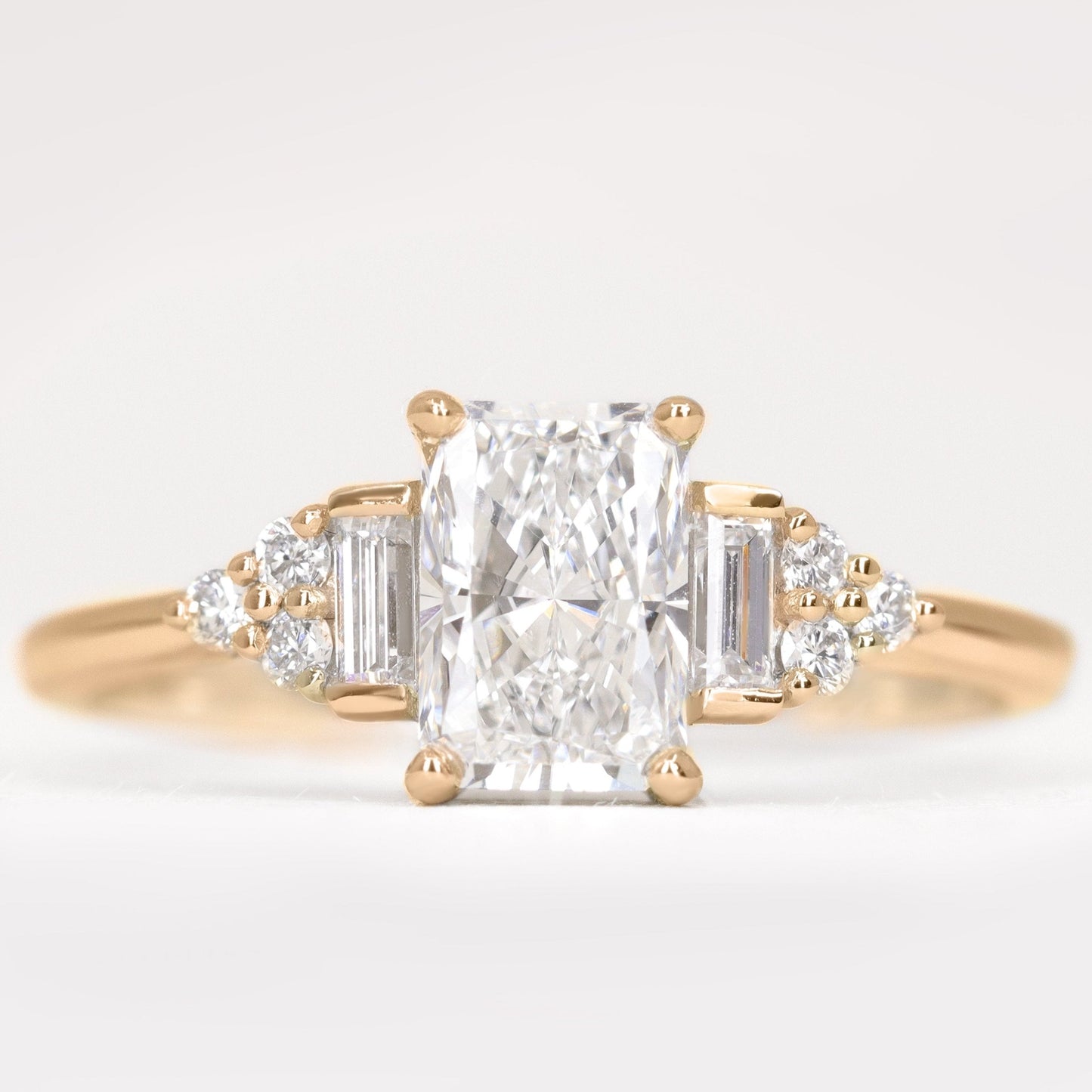 Art deco inspired radiant cut white diamond engagement ring