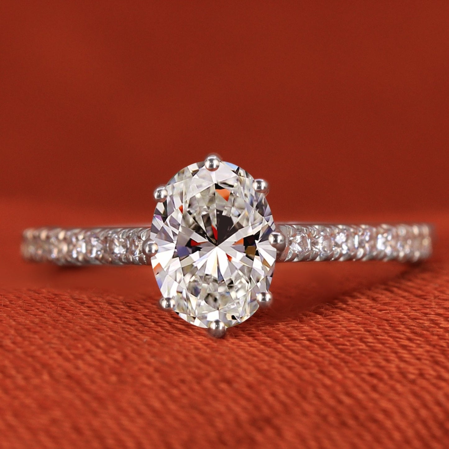 Lab grown diamond solitaire engagement ring with diamond pave band