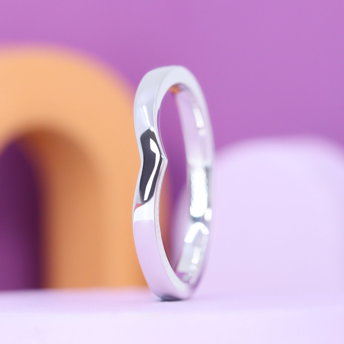 Platinum wedding ring in wishbone shape