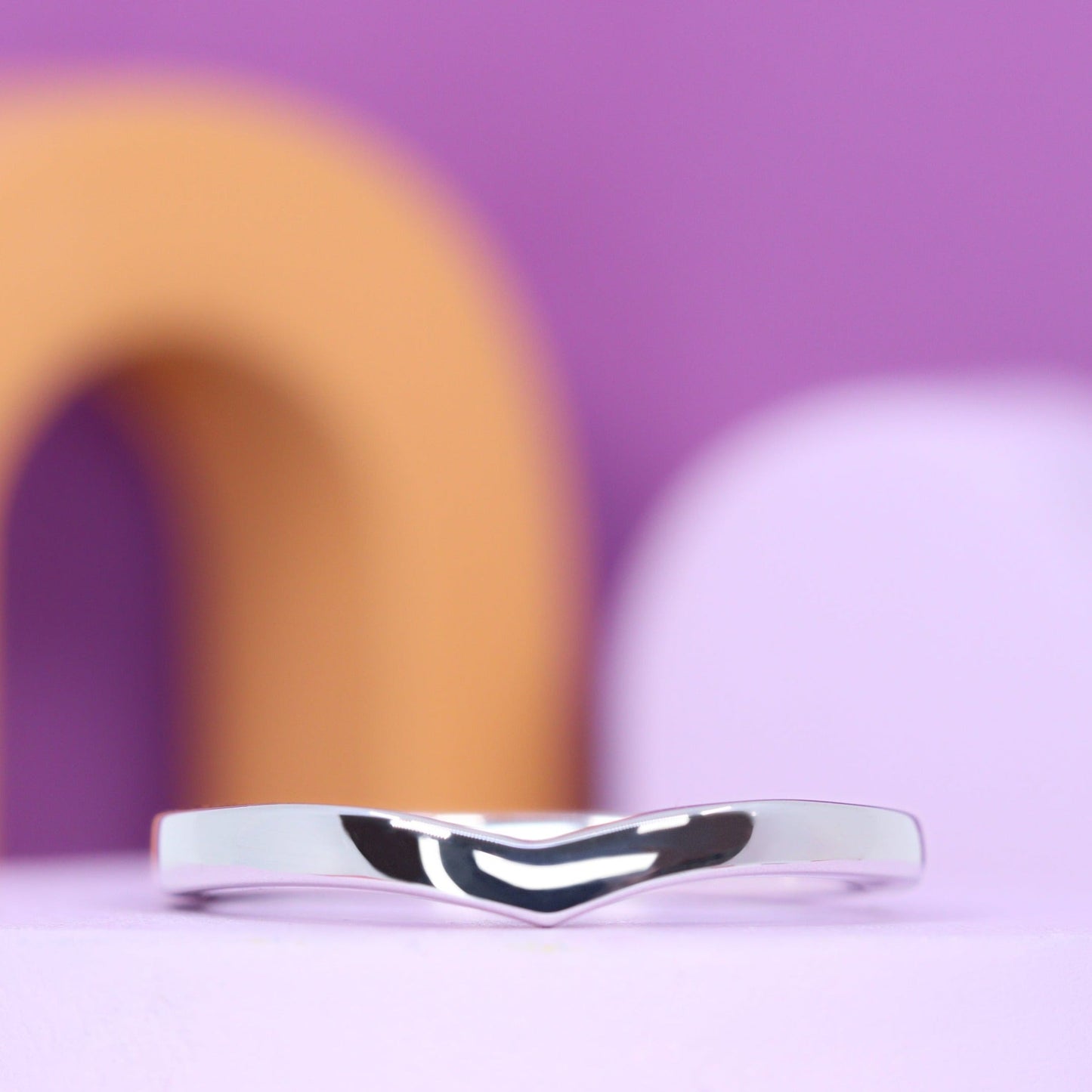 Platinum wedding ring in wishbone shape