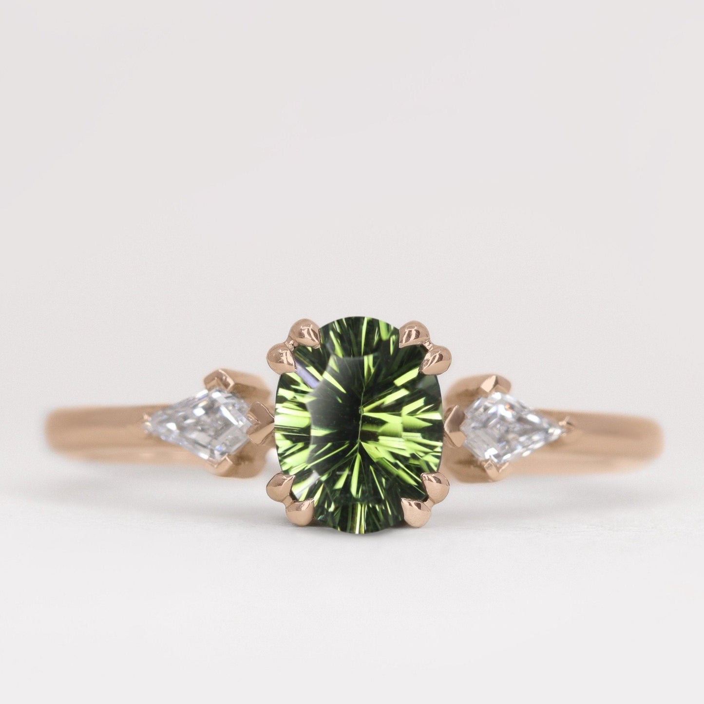 Tourmaline engagement ring with white diamonds in rose gold