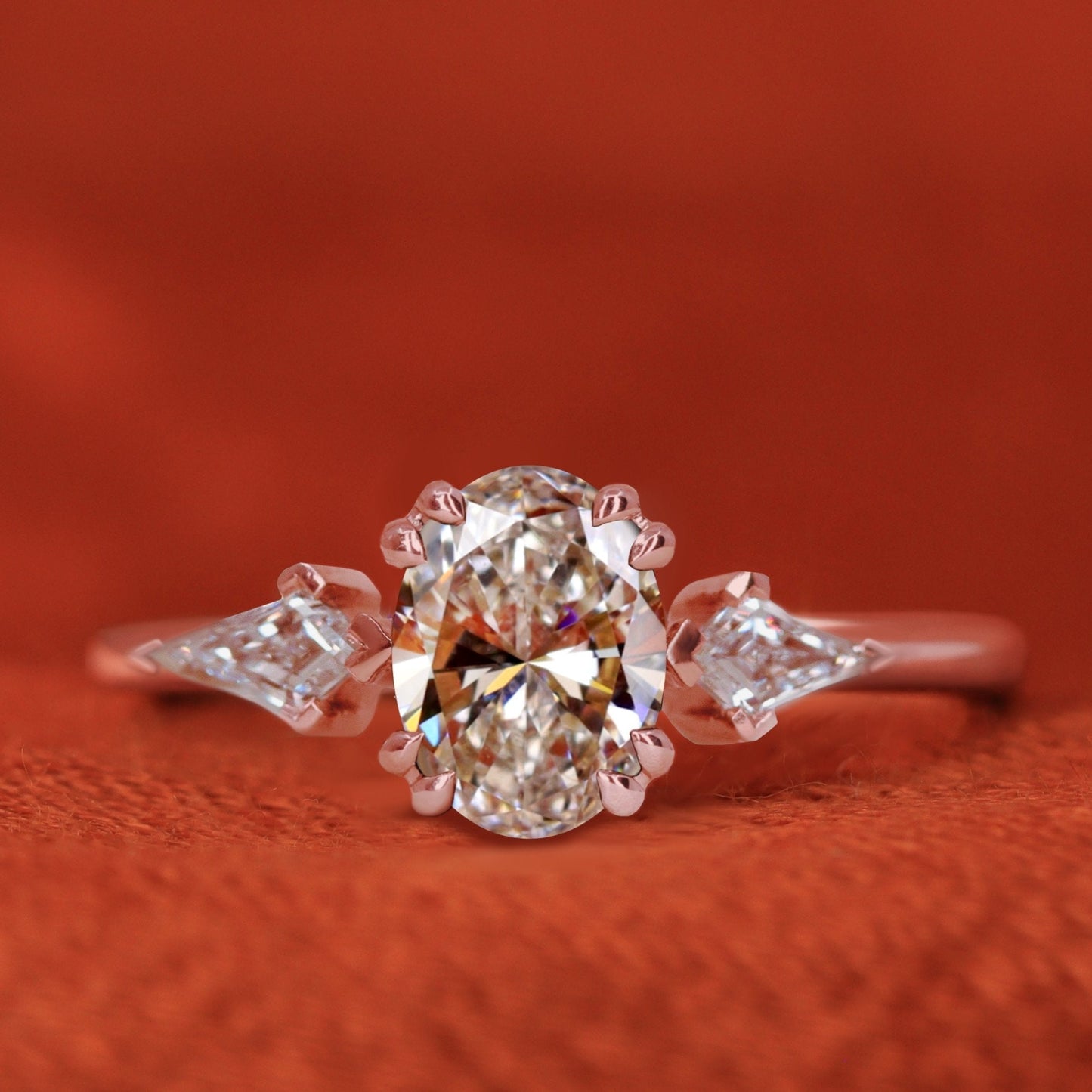 Oval and kite cut white diamond trilogy unique engagement ring