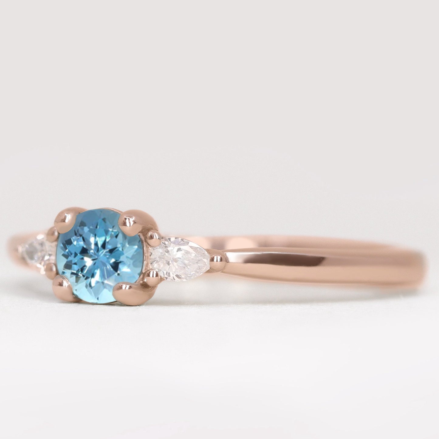 Unique aquamarine and lab grown diamond rose gold engagement ring