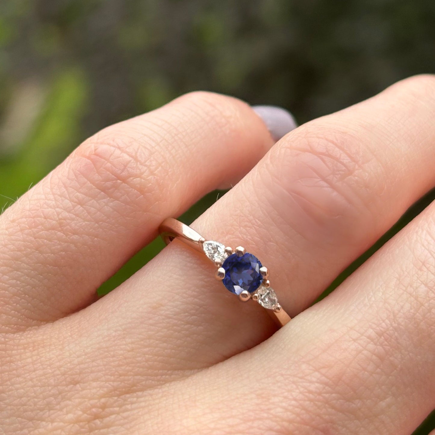 Unique round blue sapphire and lab grown diamond rose gold engagement ring