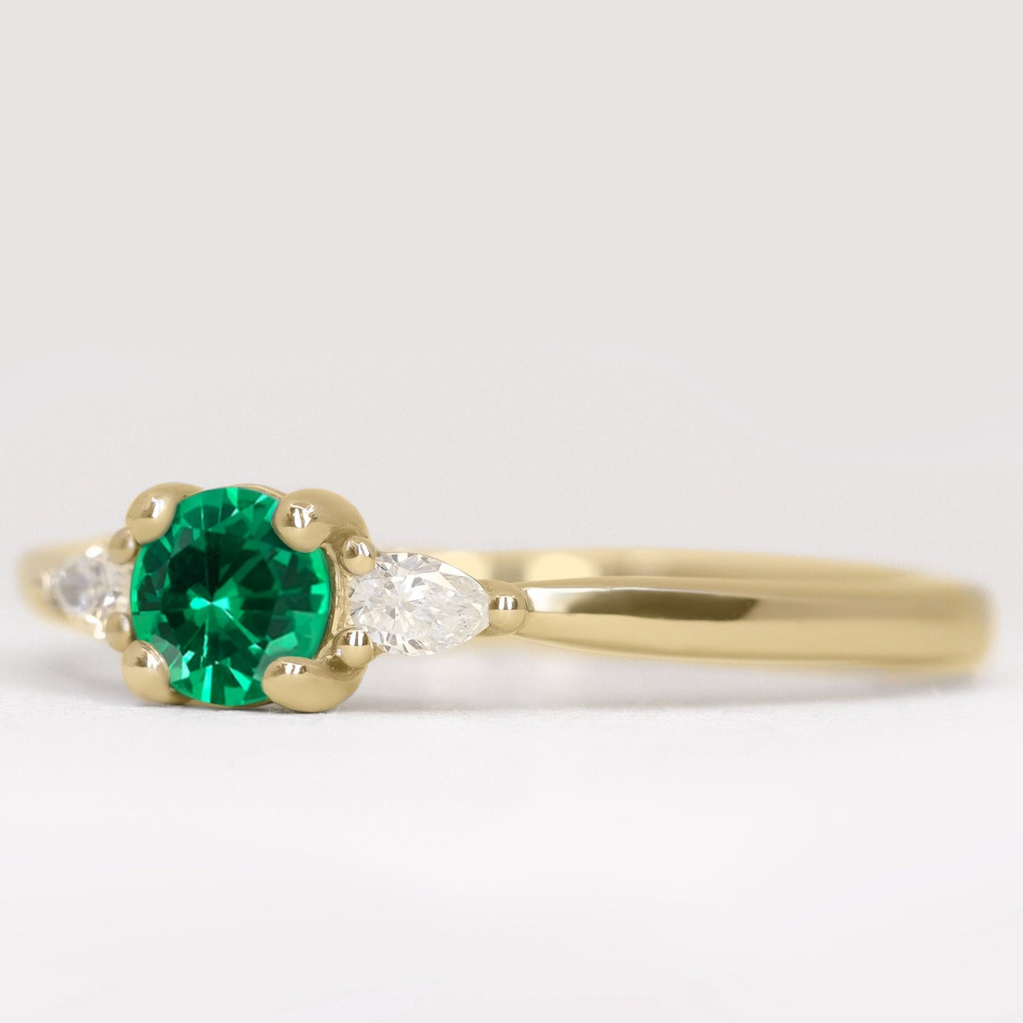 Elspeth emerald and lab grown diamond yellow gold engagement ring