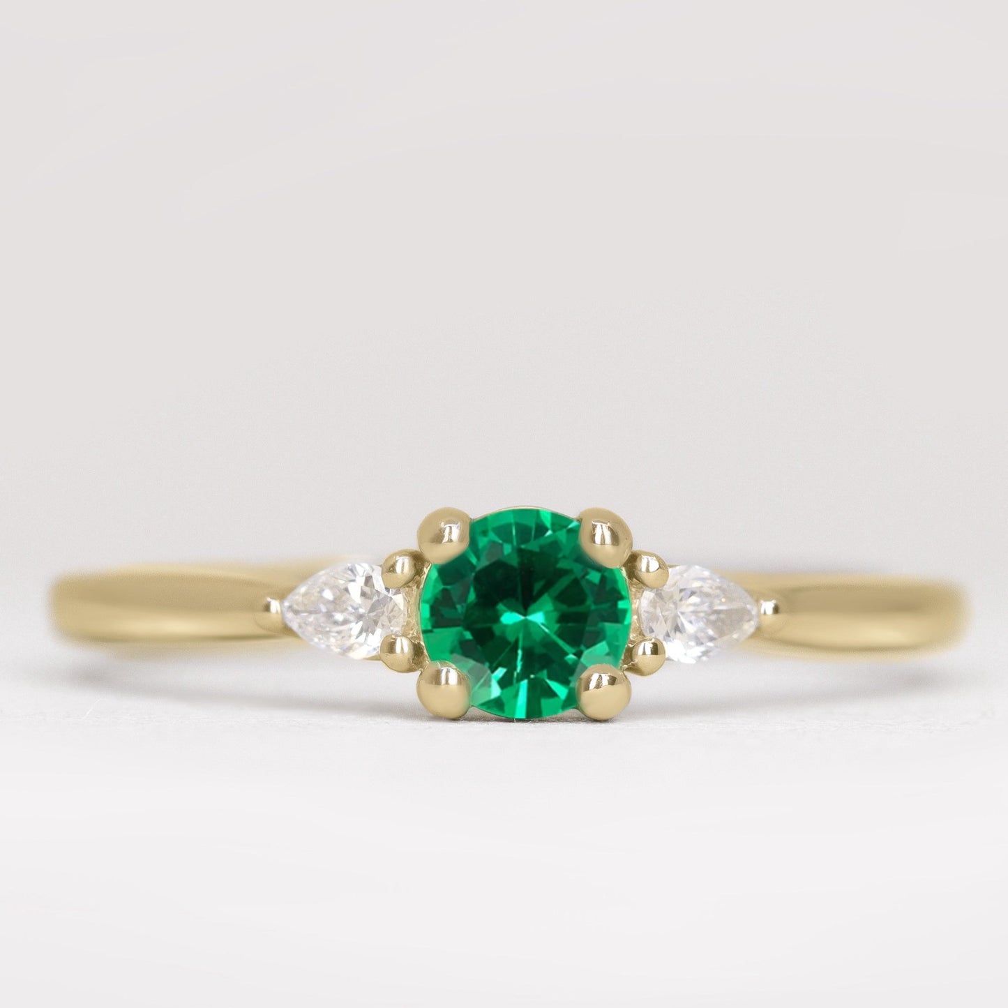 Elspeth emerald and lab grown diamond yellow gold engagement ring