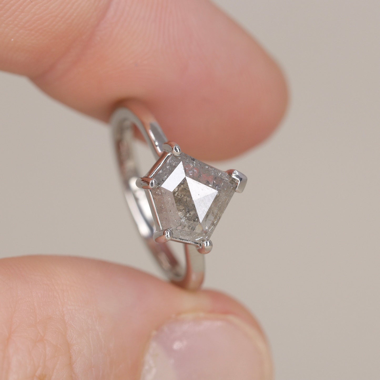 Shield cut salt and pepper diamond solitaire engagement ring