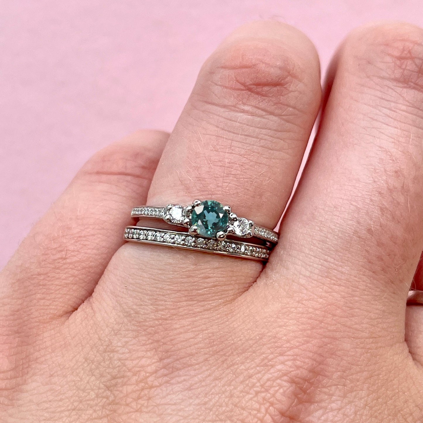 Teal sapphire and diamond engagement ring and diamond wedding ring set