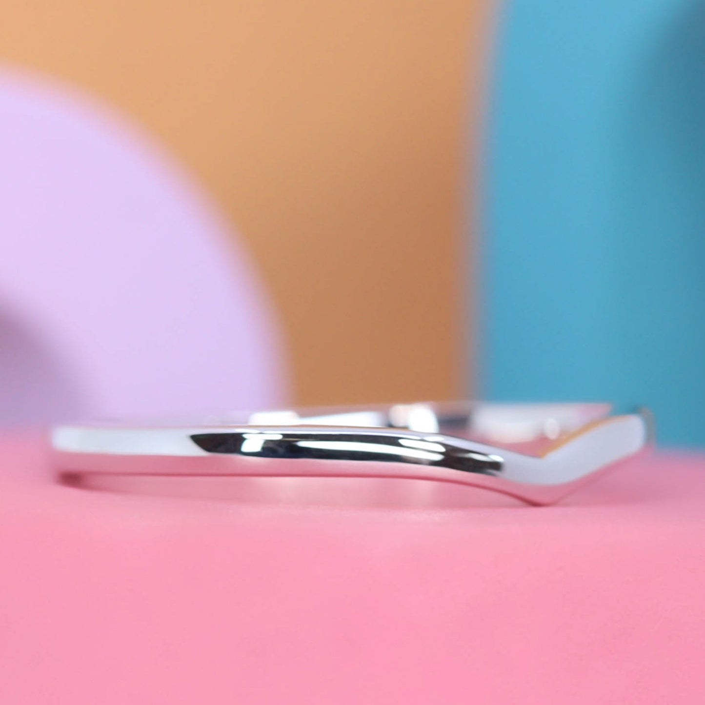 Clara wishbone shaped platinum wedding ring