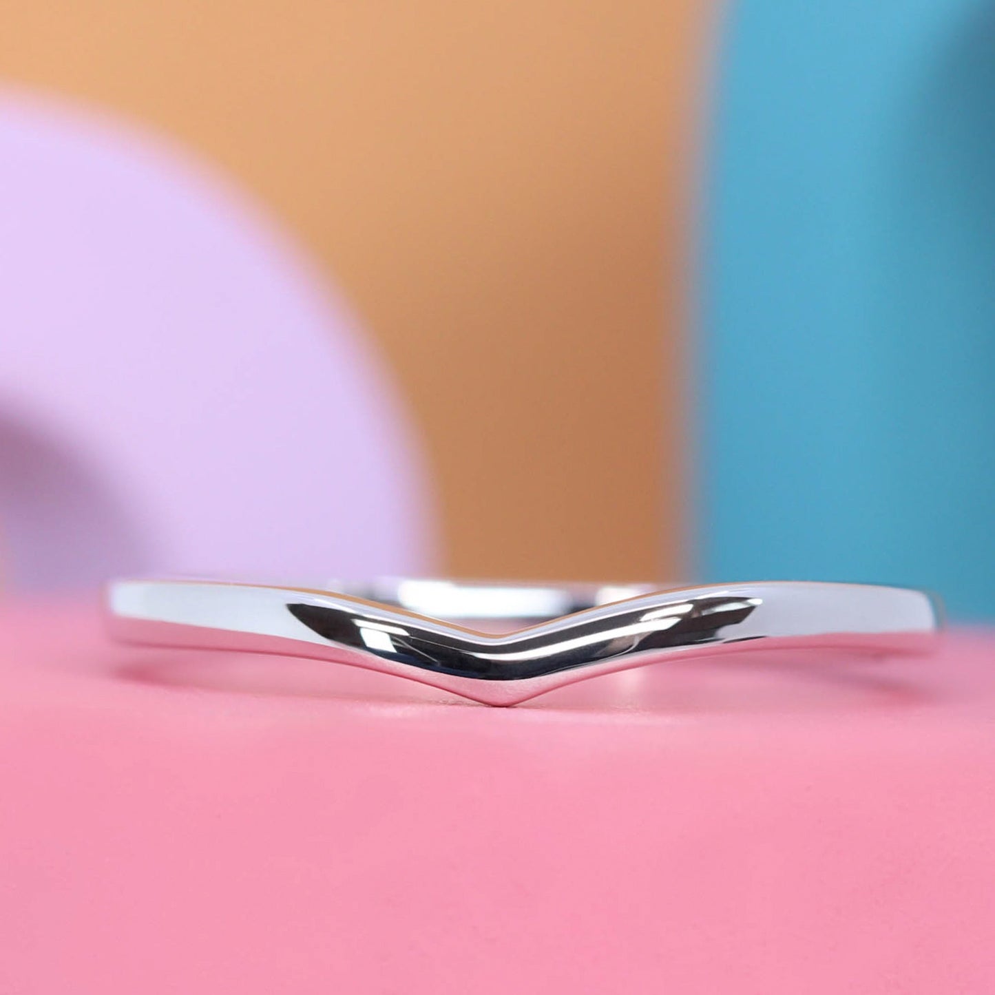 Clara wishbone shaped platinum wedding ring